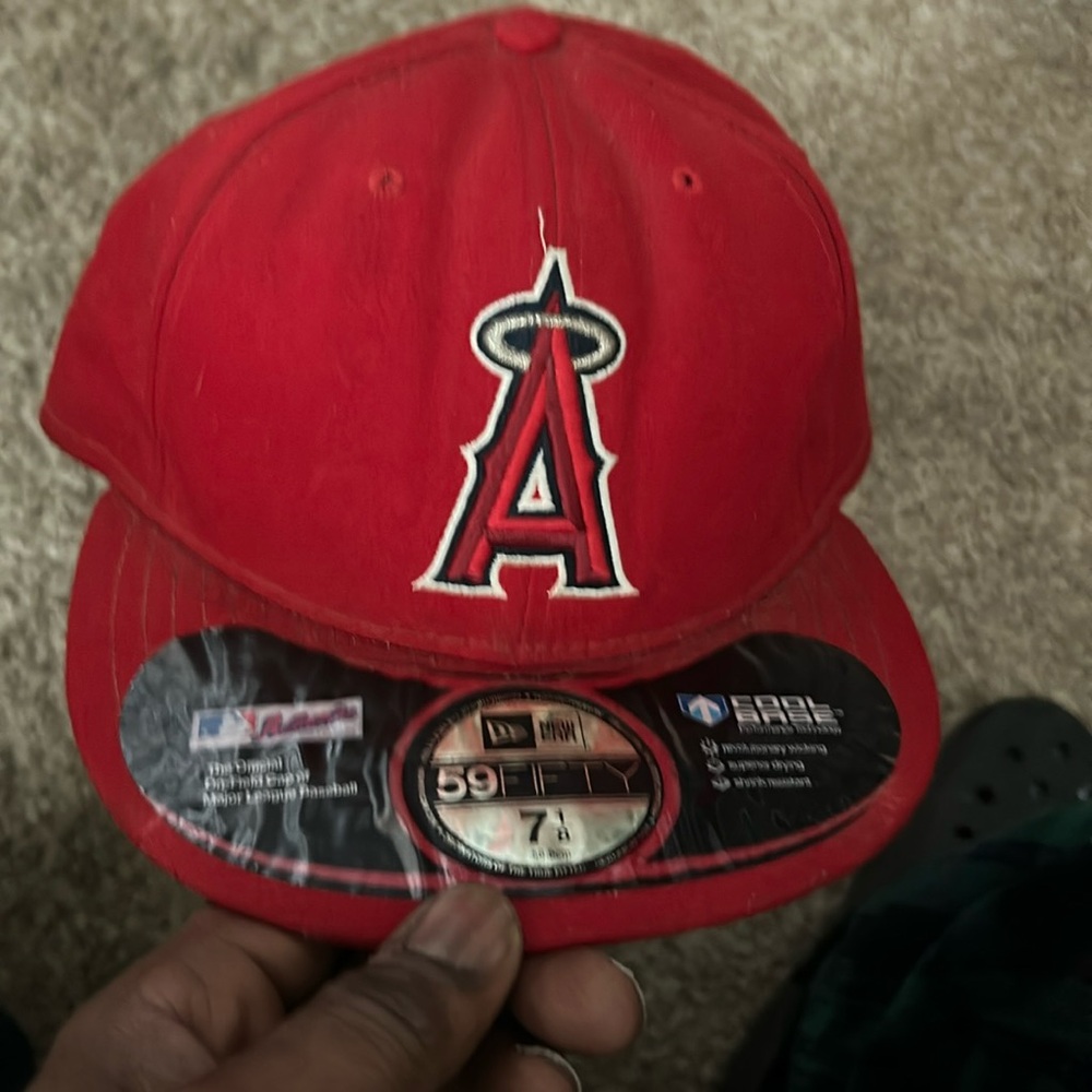 7 1/8 Worn a few times. Like new. Red Anaheim Angels